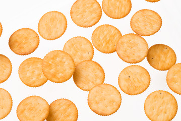 Top view of round crackers isolated on white background.
