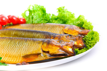 Hot smoked herring on plate