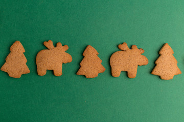 green background with ginger biscuits