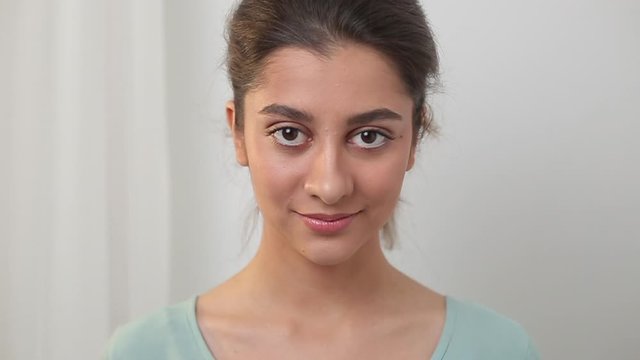Portrait of indian teenage teenage girl. Young happy pretty woman.
