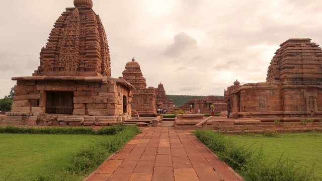 Motion shot, Group of monuments at Pattadakal historic travel destination of southern India - Protected 7th and 8th century CE Hindu and Jain temples of Pattadakallu.