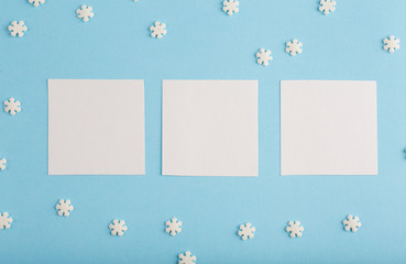 New Year's card with snowflakes on a blue background