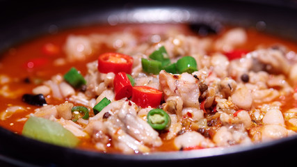 Close up of spicy fried bullfrog, delicious and tasty Chinese food, typical Sichuan food style.
