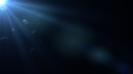 sunny blue lens flare overlay texture with bokeh effects on black background 
