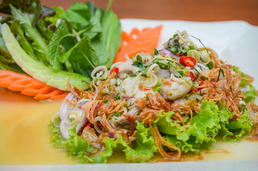 Fresh oyster salad with chilli paste and fried onion