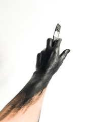 Black color acrylic painted hand of an artist man
