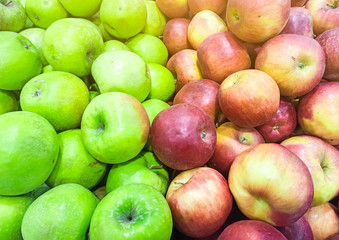Fototapeta na wymiar Apples lying in the supermarket. Healthy vitamin fruit.