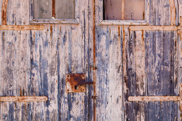 The texture of wooden doors on the island of Malta