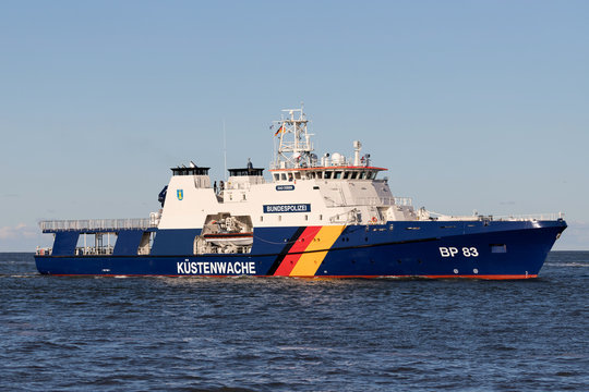 CUXHAVEN, GERMANY - OCTOBER 29, 2019: German Federal Police boat BP 83 BAD D&Uuml;BEN on the river Elbe. The Kustenwache is an association of several federal agencies.