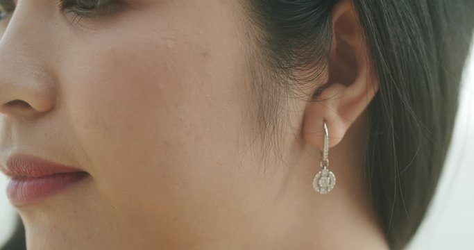 close up asian woman earring