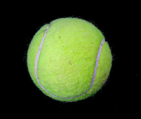 tennis ball on black  background