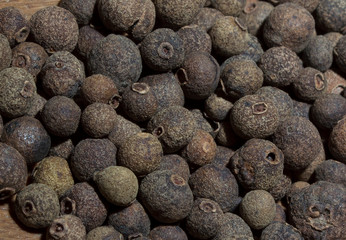 the texture of whole allspice closeup, condiments and spices