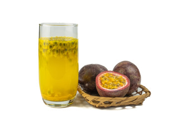 passion fruit juice and a half maracuya fruit (Passiflora edulis) isolated on white background