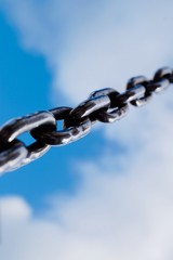 strong steel chain for industry, blue background