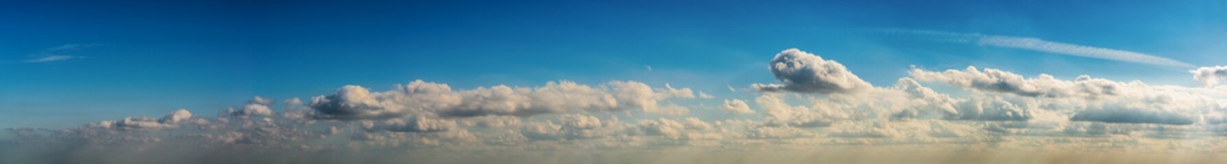 Fantastic soft clouds against blue sky, natural composition - panorama