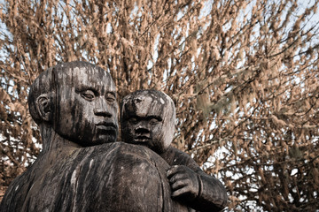 Wooden figures of parent and child