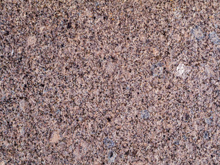 Granite granular texture with stains texture, granite surface and background.