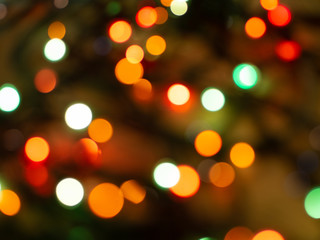 Obraz premium Christmas light background. Holiday glowing backdrop. Defocused Background. Blurred Bokeh.