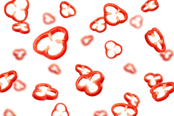 Falling sweet pepper slices, paprika, isolated on white background, selective focus