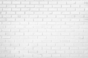 White brick wall texture background in room at subway. Brickwork stonework interior, rock old clean concrete grid uneven abstract weathered bricks tile design, horizontal architecture wallpaper.