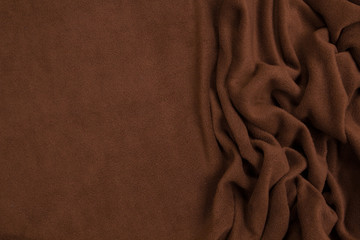 Fabric fleece brown view from the top. Texture of textile fleece bedspread. © fizke7