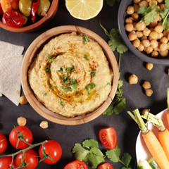 lebanese food assortment, hummus and vegetable dips