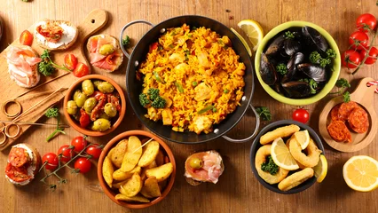 Foto op Canvas assorted of spanish food, tapas, paella, mussel,olive © M.studio