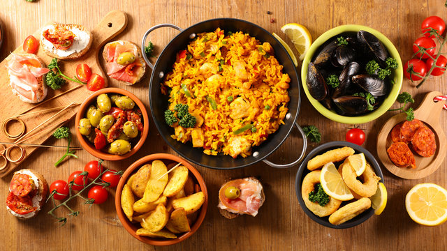 assorted of spanish food, tapas, paella, mussel,olive