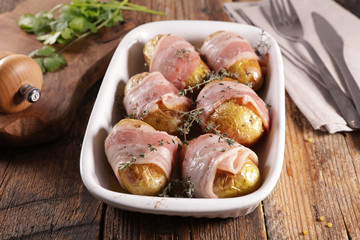 baked potato with bacon and herb