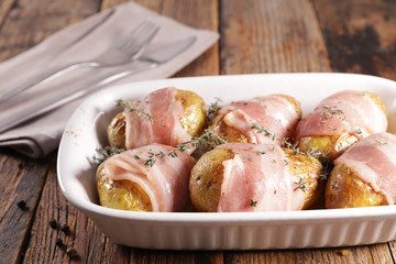 baked potato with bacon and herb