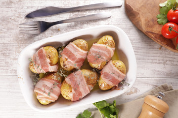 baked potato with bacon and herb