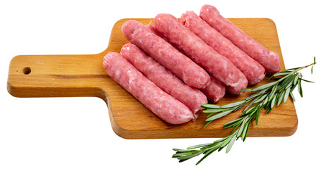 Raw farm sausages with rosemary