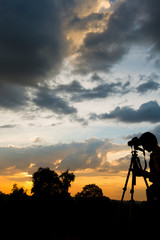 sunsey with beautiful colors and silhoueets in the foreground 