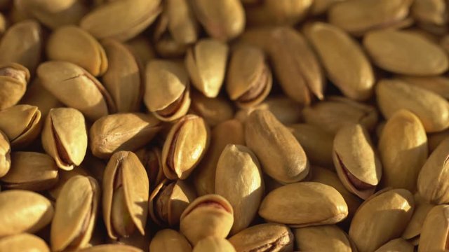 Roasted pistachios close-up. Pistachio nut with salt. macro