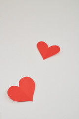 Red paper hearts isolated on white