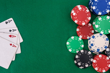 Poker chips with playing cards on table for blackjack. Casino and gambling