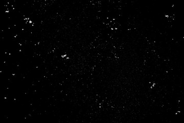 ash particles on the black background - perfect texture for snowfall photo