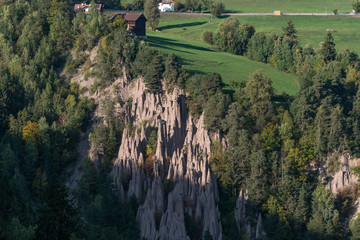 Earth pyramids at the Ritten near Lengmoos in Dolomites, South Tyrol, Italy