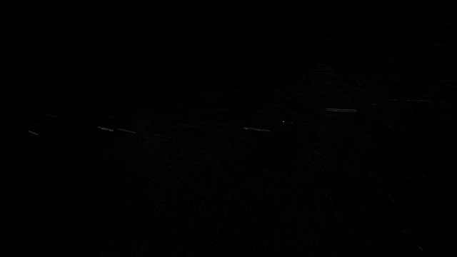 white vapour or spray water on a black background ,slow motion movement