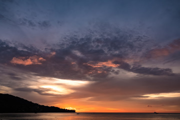 Fototapeta na wymiar Sunset over the ocean, Phuket, Krabi beach, Thailand