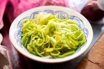 Sliced leek on a plate. Ingredient for the salad.