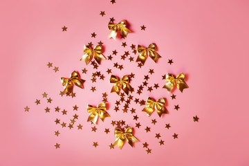 Festive pinky background with golden stars and glitter