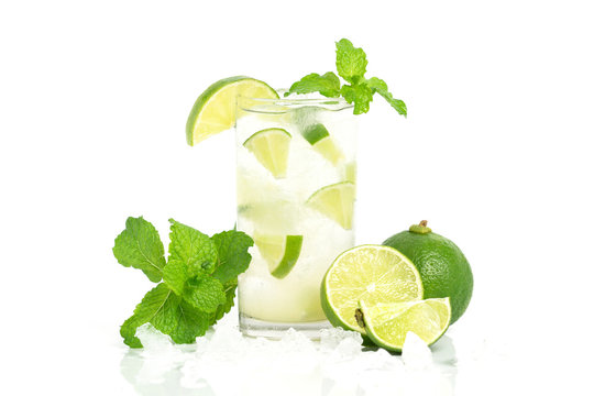 lemonade in Glass via lime pepermint water ice with white background
