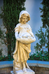 Marble Statue of a Girl Looking down