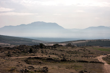 Fototapeta na wymiar mysterious mountains shrouded in fog