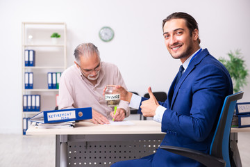 Financial advisor giving retirement advice to old man