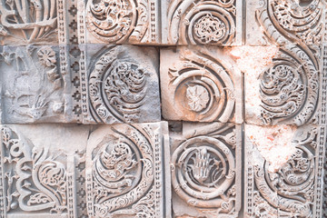 Architectural details in the columns at the Qutub Minar ancient ruins complex in Delhi, India