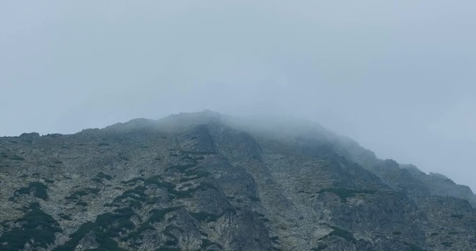 Close up peack of musala mountain with clouds	