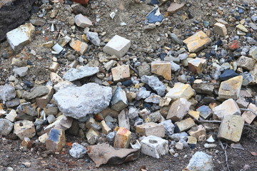 Construction waste with elements of various dismantled and destroyed old structures at municipal...