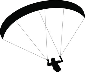 silhouette paraglider or parachutist in flight